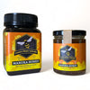 Two jars of Country Honey Australia Manuka Honey on a white background